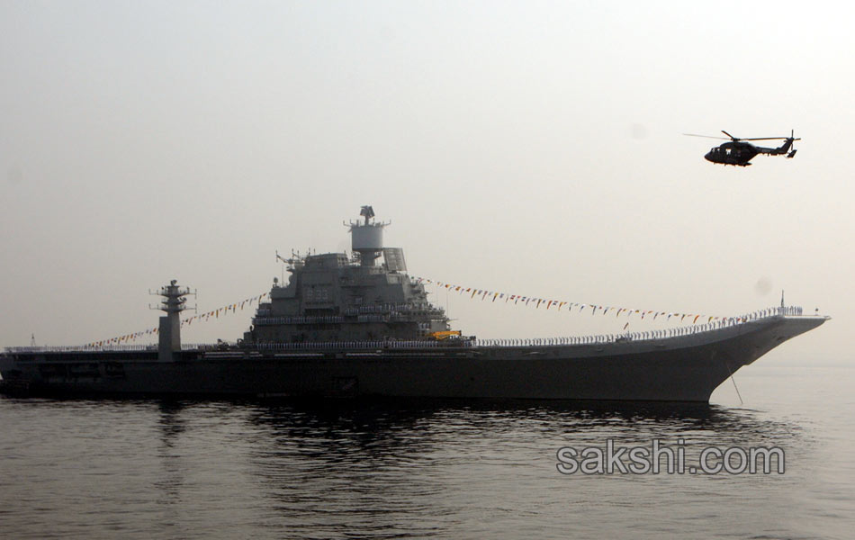 illuminated ships anchored off shore Vizag14