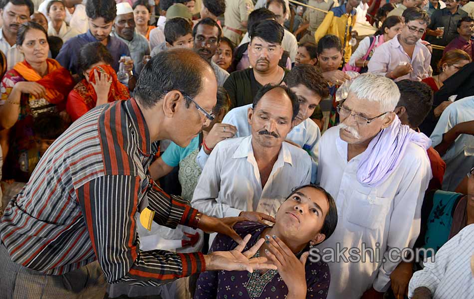 Thousands of asthma patients take fish prasadam in Hyderabad13