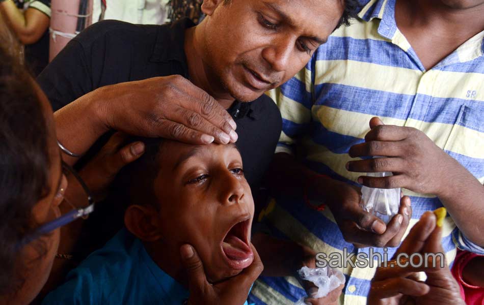 Thousands of asthma patients take fish prasadam in Hyderabad23