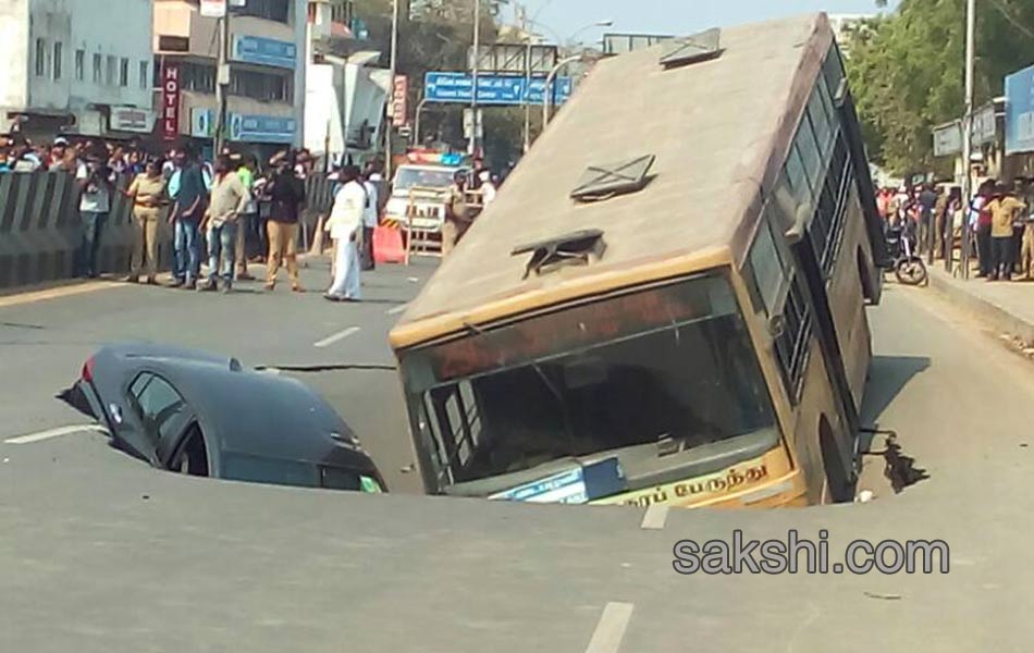 Huge cave in on popular Mount Road in Chennai swallows bus and car - Sakshi2