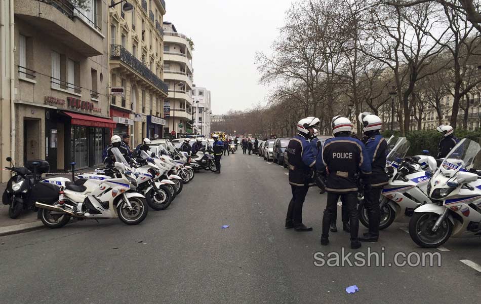 12 dead after shooting at Paris magazine9