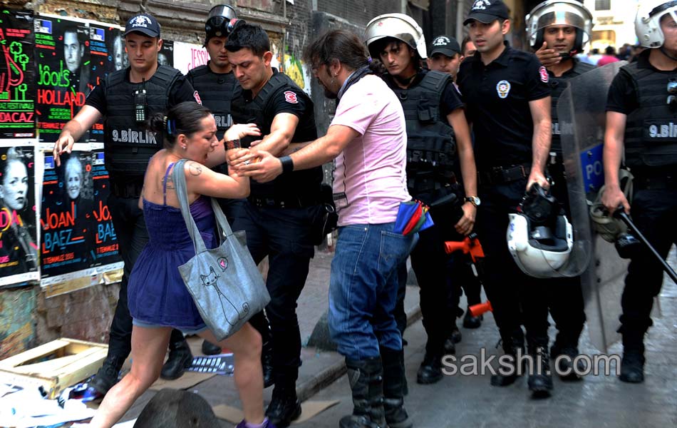 Police fire tear gas to break gay pride parade in Turkey - Sakshi4