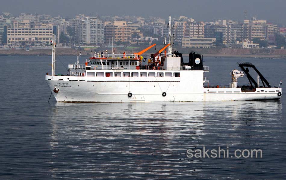 illuminated ships anchored off shore Vizag6