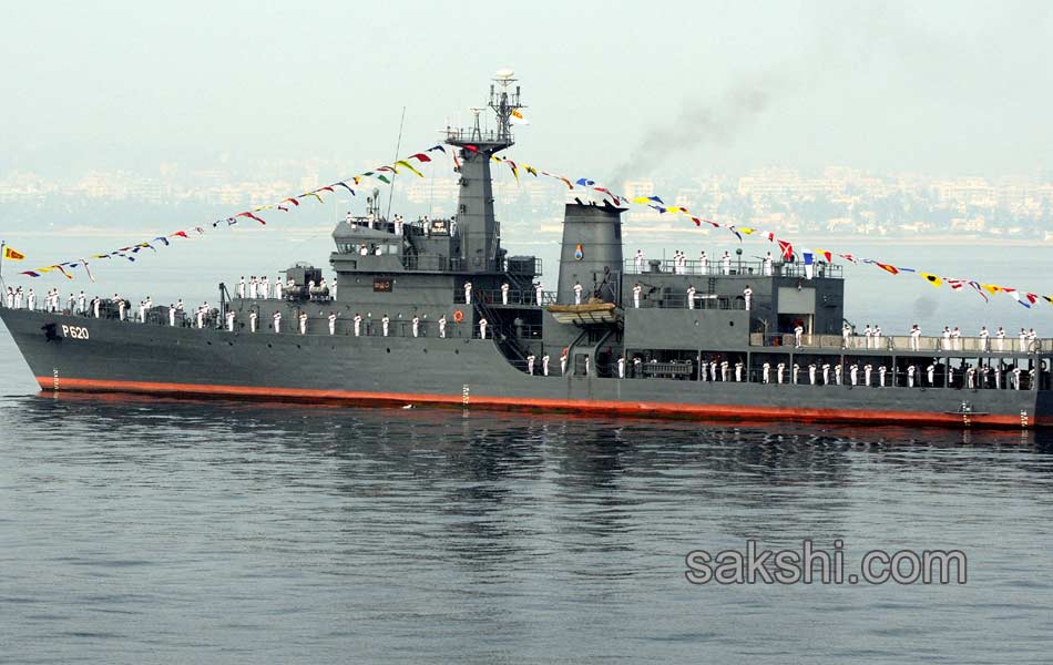 illuminated ships anchored off shore Vizag17