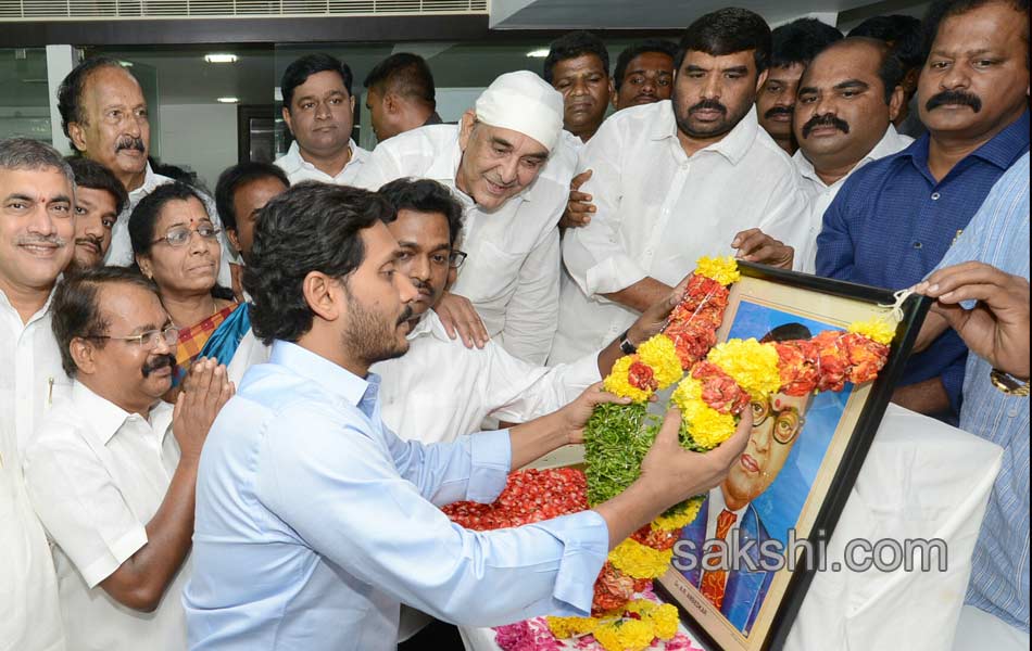 YS jagan mohan reddy tributes to Ambedkar in party office - Sakshi8