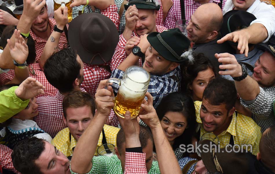 Visitors enjoys the Oktoberfest beer festival in Munich  Germany4