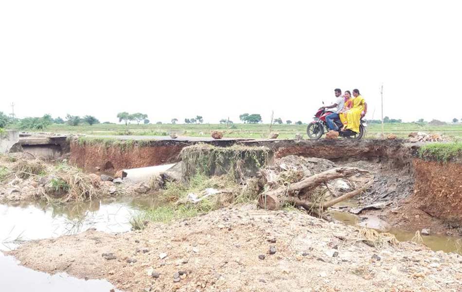 Roads destroyed - Sakshi4