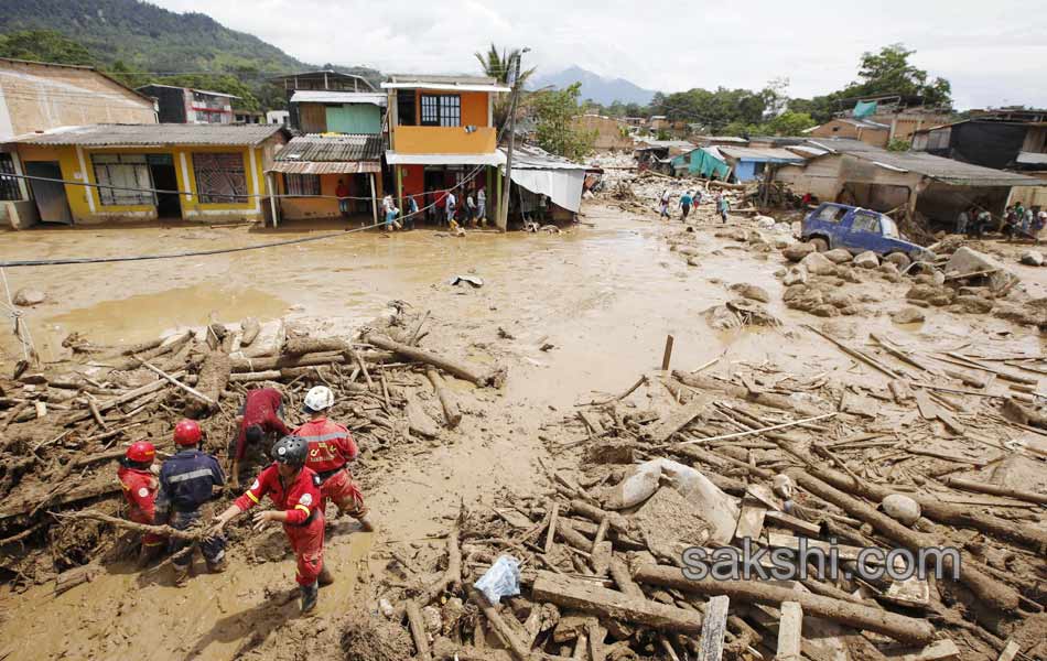 Colombia shaken after surging rivers avalanche leaves1