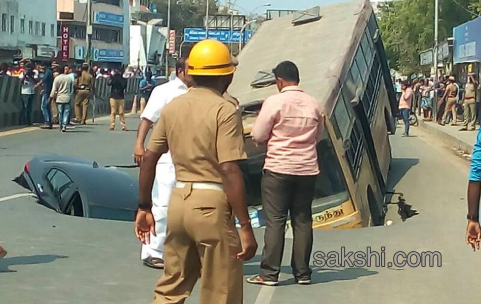 Huge cave in on popular Mount Road in Chennai swallows bus and car - Sakshi1