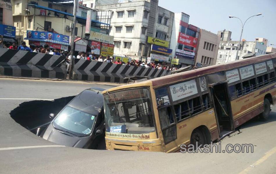 Huge cave in on popular Mount Road in Chennai swallows bus and car - Sakshi8