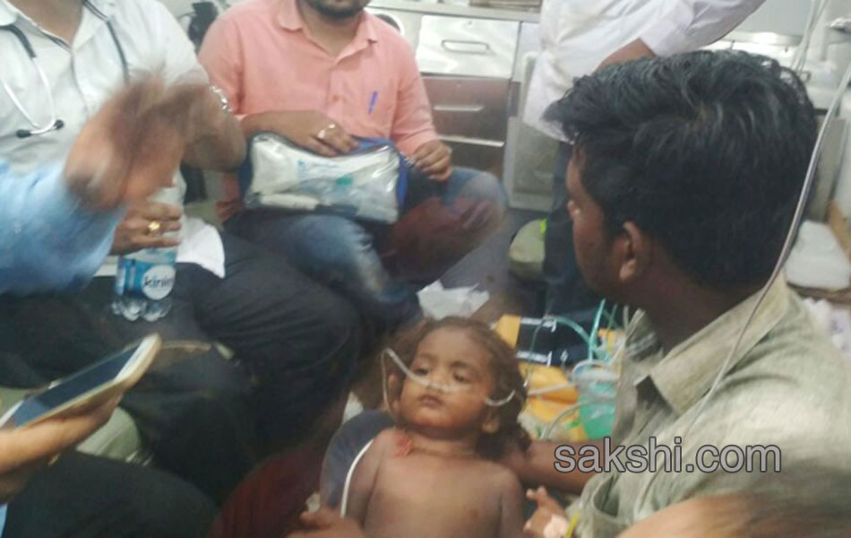 two year kid chandrashekar rescued from borewell - Sakshi11