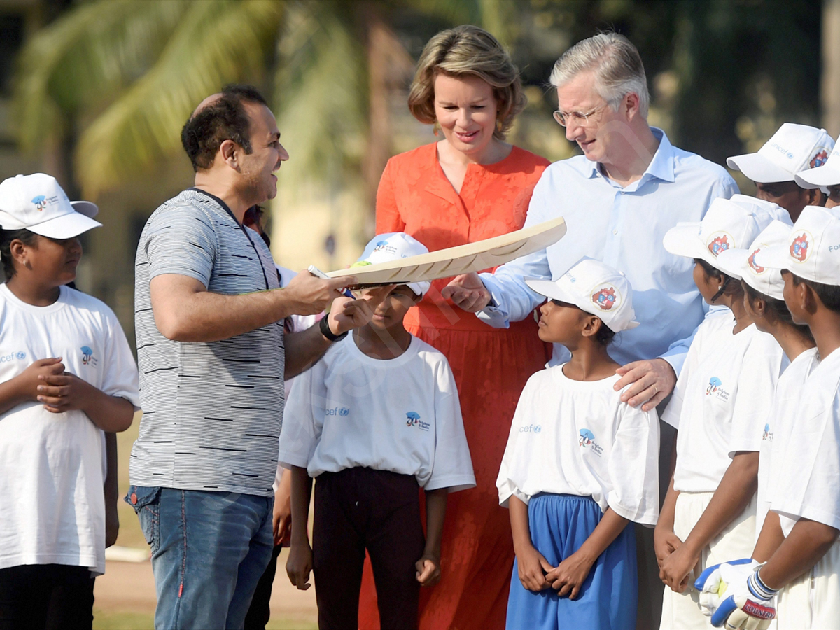 King Philippe And Queen Mathilde of Belgium Learn 'Tricks of The Trade' From Virender Sehwag - Sakshi1