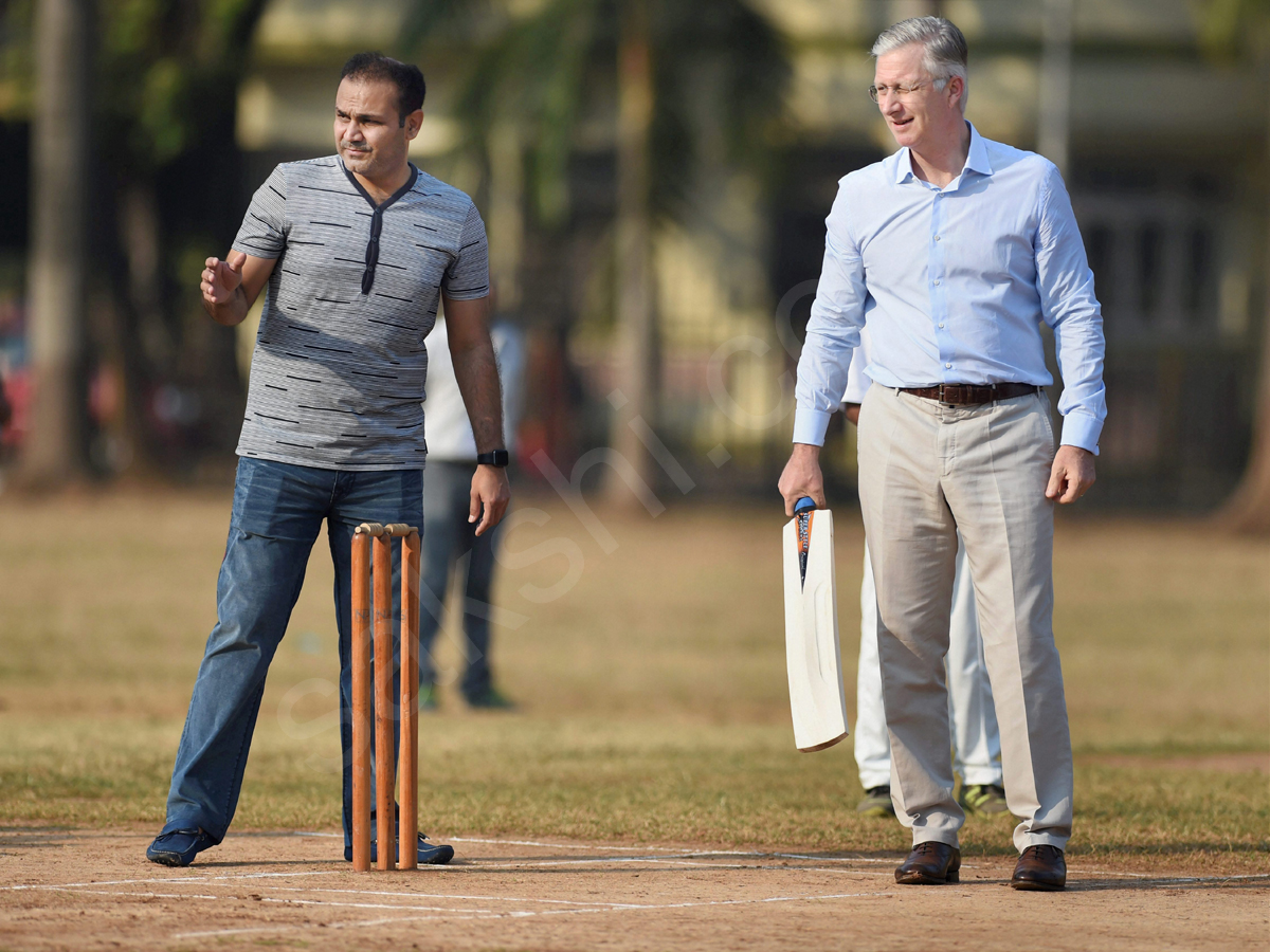 King Philippe And Queen Mathilde of Belgium Learn 'Tricks of The Trade' From Virender Sehwag - Sakshi4