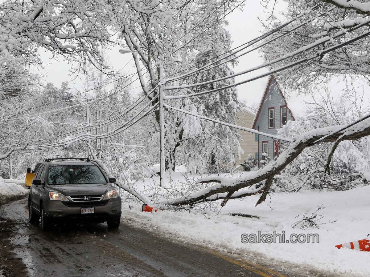 Northeast tries to dig out  power up after latest storm - Sakshi19