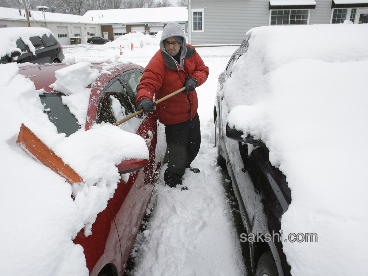 Northeast tries to dig out  power up after latest storm - Sakshi3