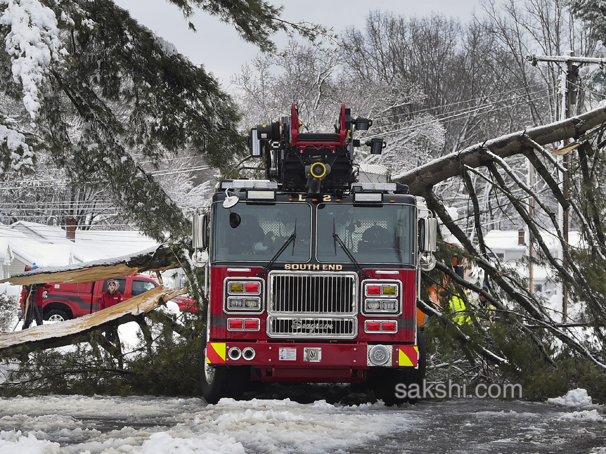 Northeast tries to dig out  power up after latest storm - Sakshi5