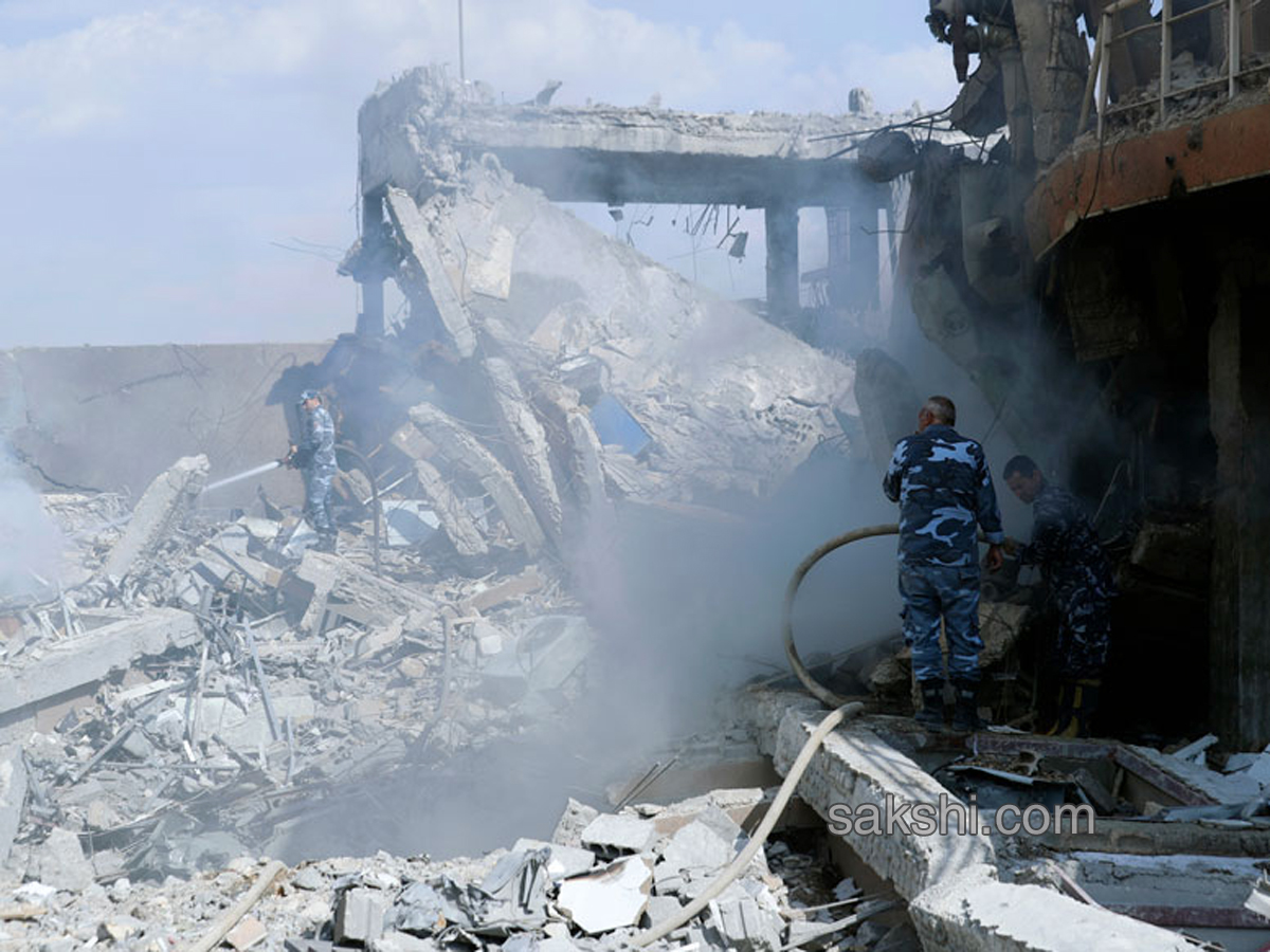 Shocking Pictures Show Aftermath of Air Strikes in Syria - Sakshi12