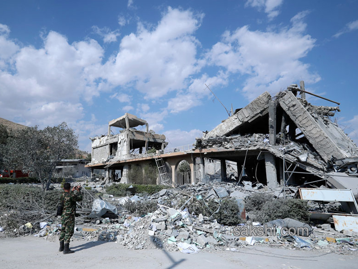 Shocking Pictures Show Aftermath of Air Strikes in Syria - Sakshi14