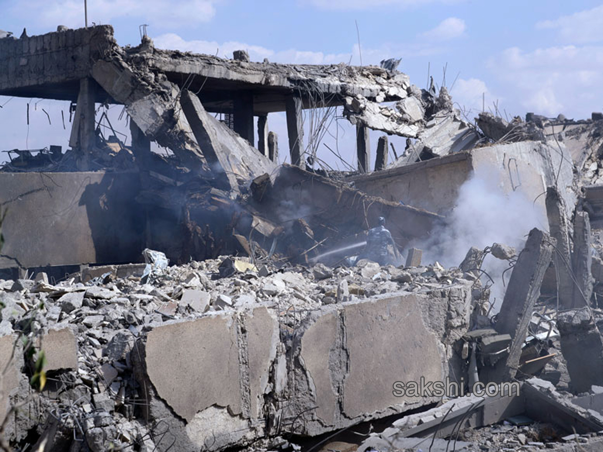 Shocking Pictures Show Aftermath of Air Strikes in Syria - Sakshi4