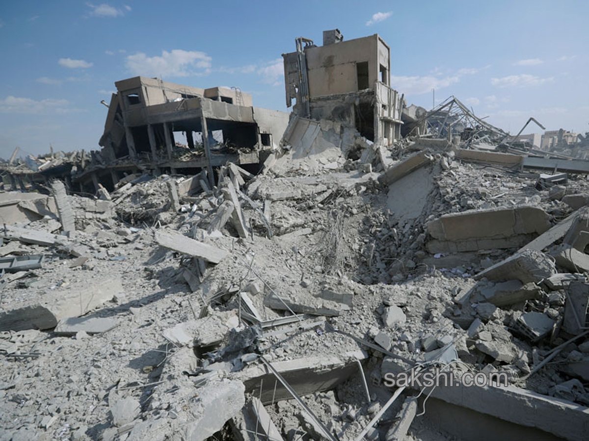 Shocking Pictures Show Aftermath of Air Strikes in Syria - Sakshi7