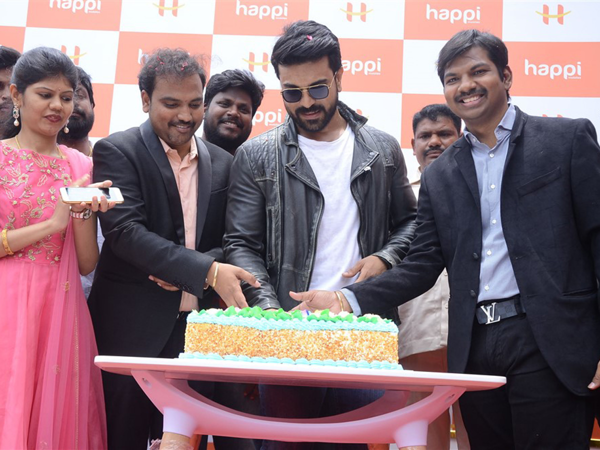 Ram Charan launches Happi Mobile Store in Chandanagar Photo Gallery - Sakshi18