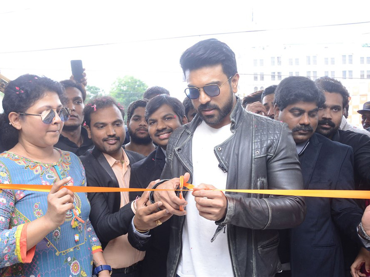 Ram Charan launches Happi Mobile Store in Chandanagar Photo Gallery - Sakshi3