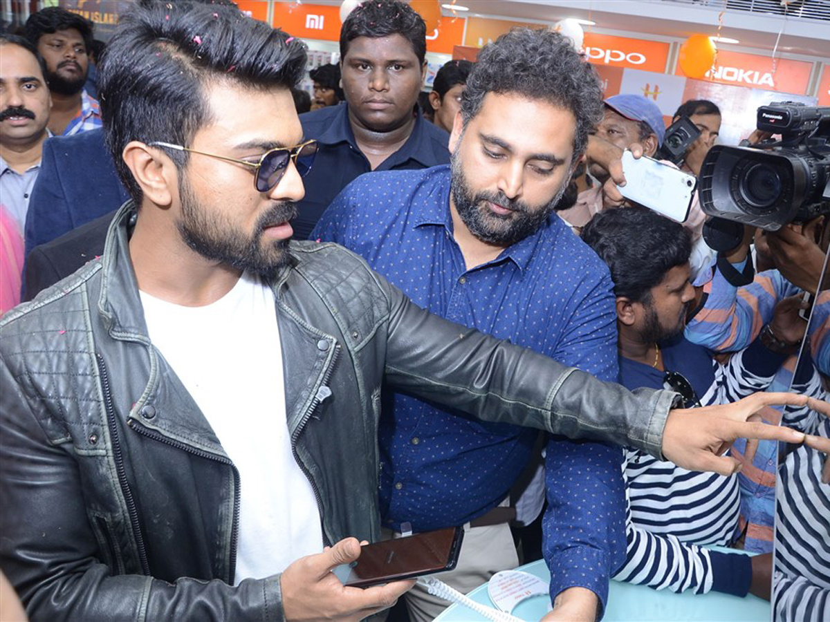 Ram Charan launches Happi Mobile Store in Chandanagar Photo Gallery - Sakshi6