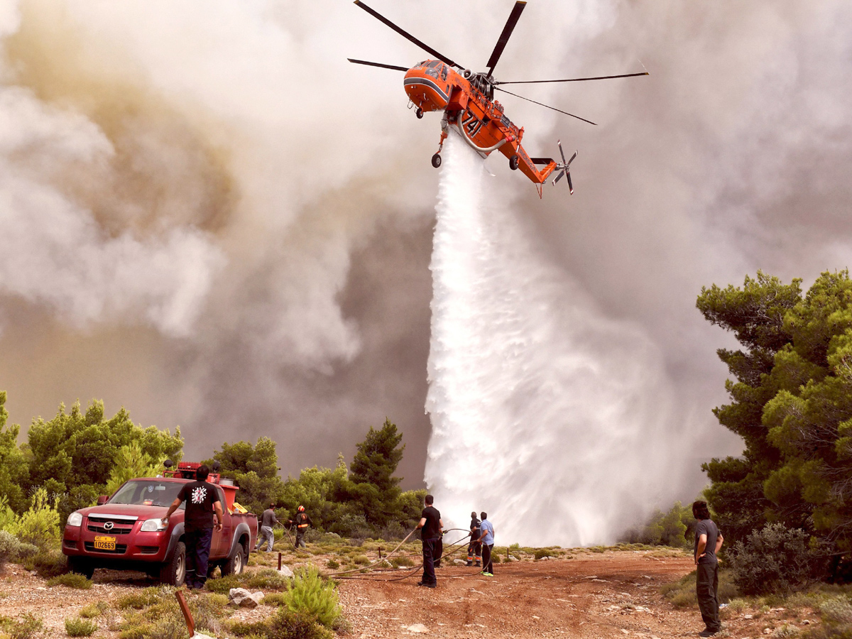 Greece wildfires: Dozens dead in Attica region Photo Gallery - Sakshi2