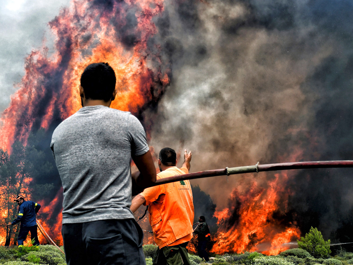 Greece wildfires: Dozens dead in Attica region Photo Gallery - Sakshi3