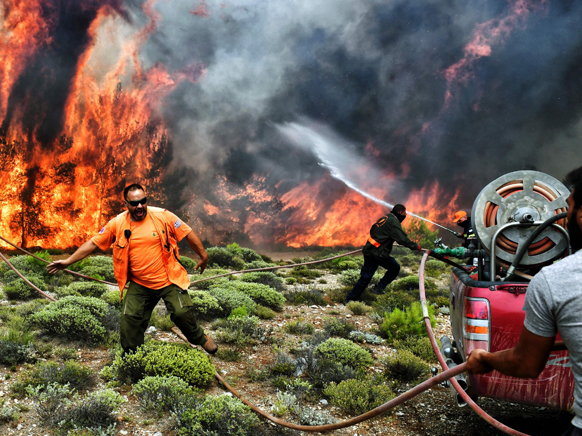 Greece wildfires: Dozens dead in Attica region Photo Gallery - Sakshi4