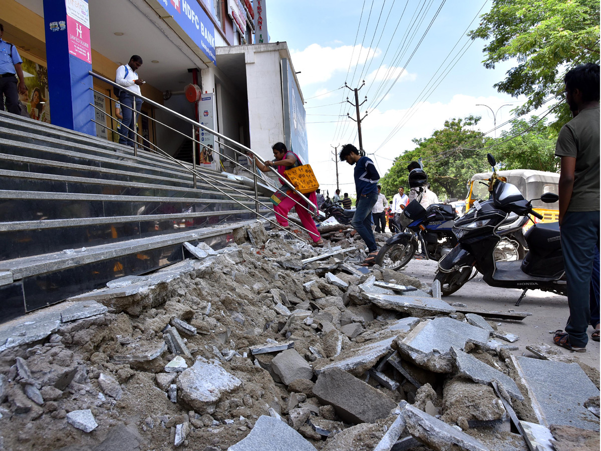  Demolition of Footpath Photo Gallery - Sakshi17