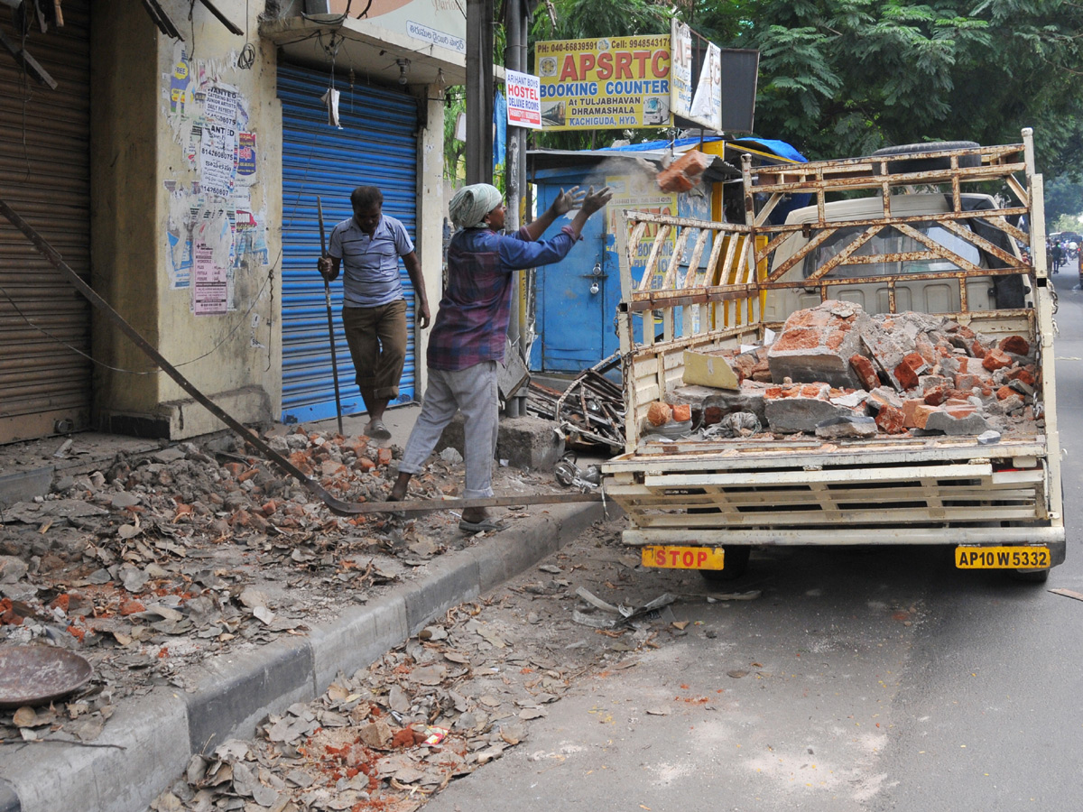  Demolition of Footpath Photo Gallery - Sakshi25