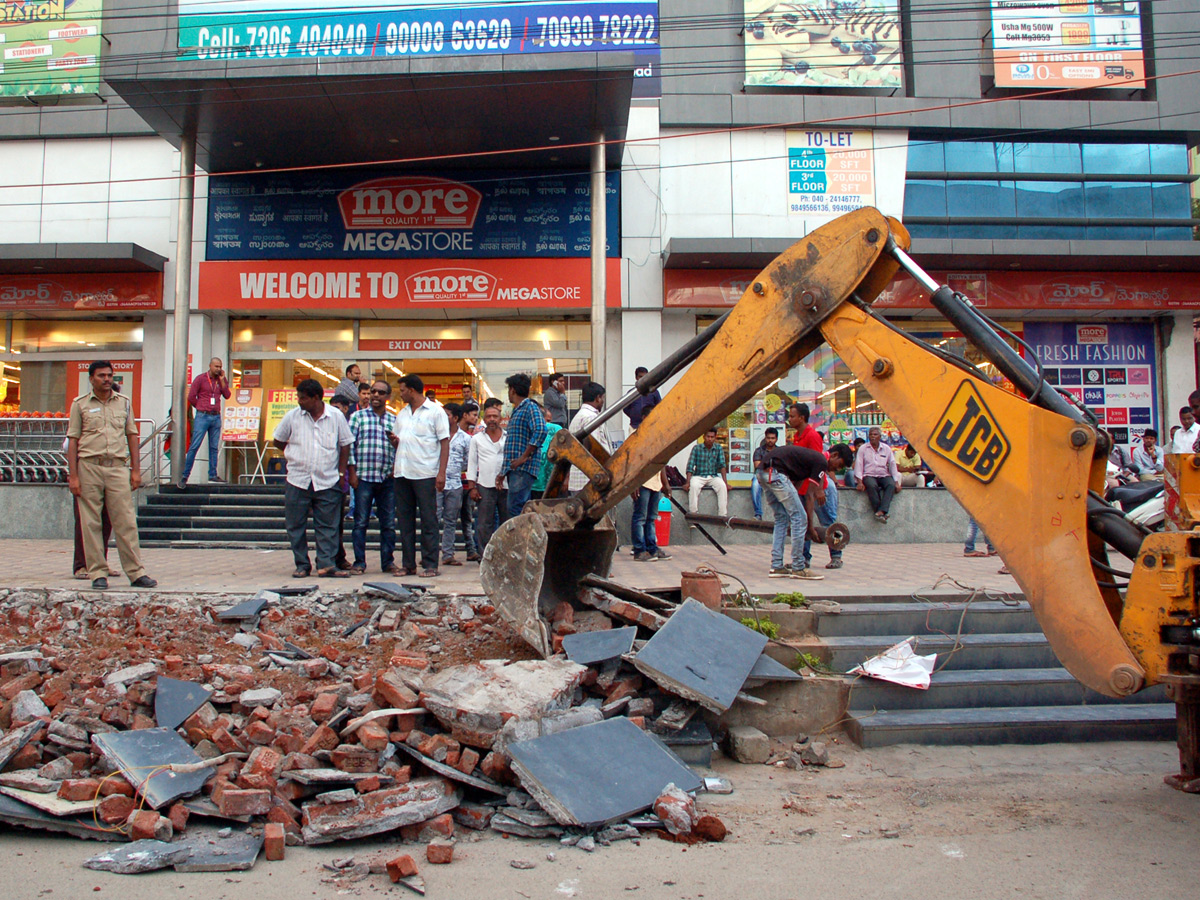  Demolition of Footpath Photo Gallery - Sakshi1