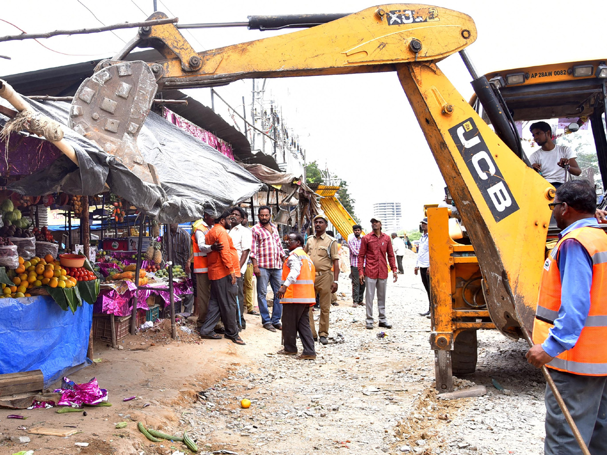  Demolition of Footpath Photo Gallery - Sakshi10