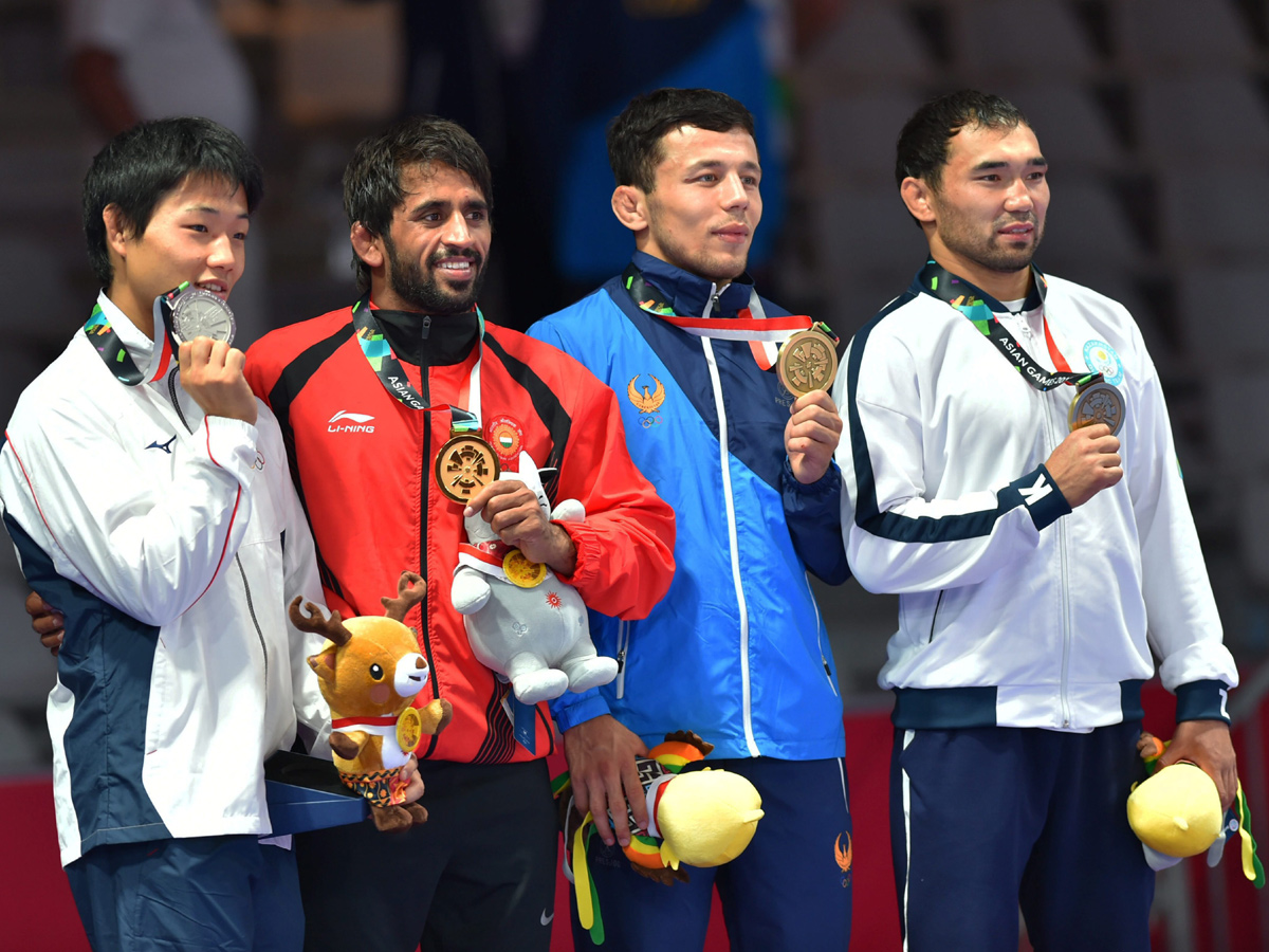 Indian Wrestler Bajrang Punia Wins Gold at Asian Games 2018 - Sakshi6