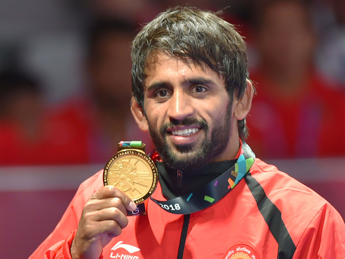 Indian Wrestler Bajrang Punia Wins Gold at Asian Games 2018 - Sakshi9