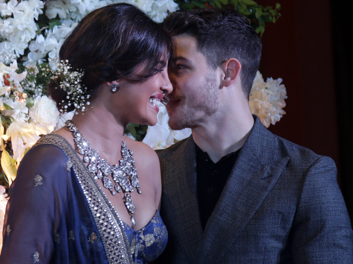 Priyanka Chopra and Nick Jonas pose wedding reception in Mumbai - Sakshi10