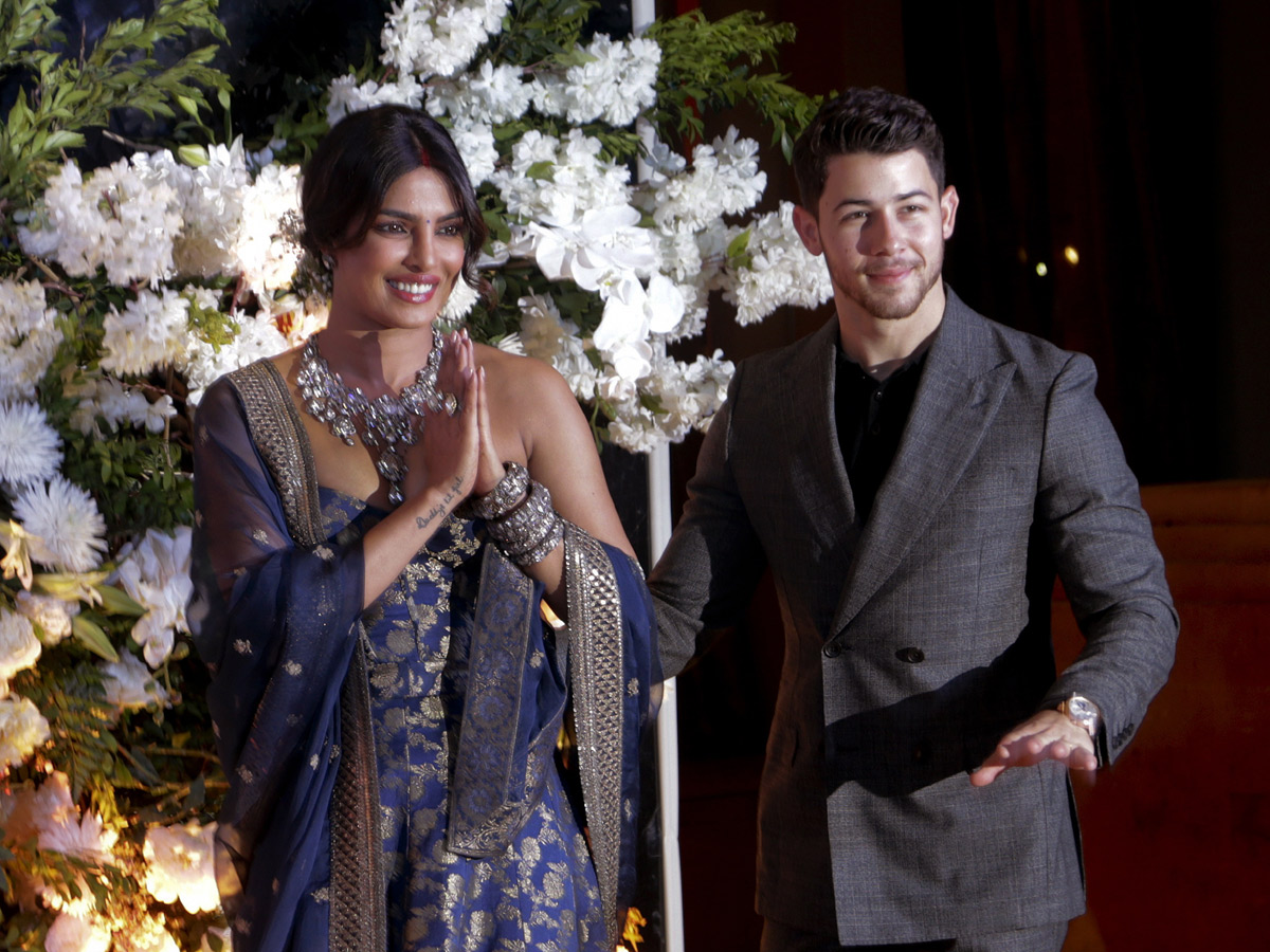 Priyanka Chopra and Nick Jonas pose wedding reception in Mumbai - Sakshi4