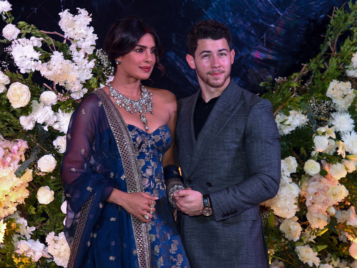 Priyanka Chopra and Nick Jonas pose wedding reception in Mumbai - Sakshi5