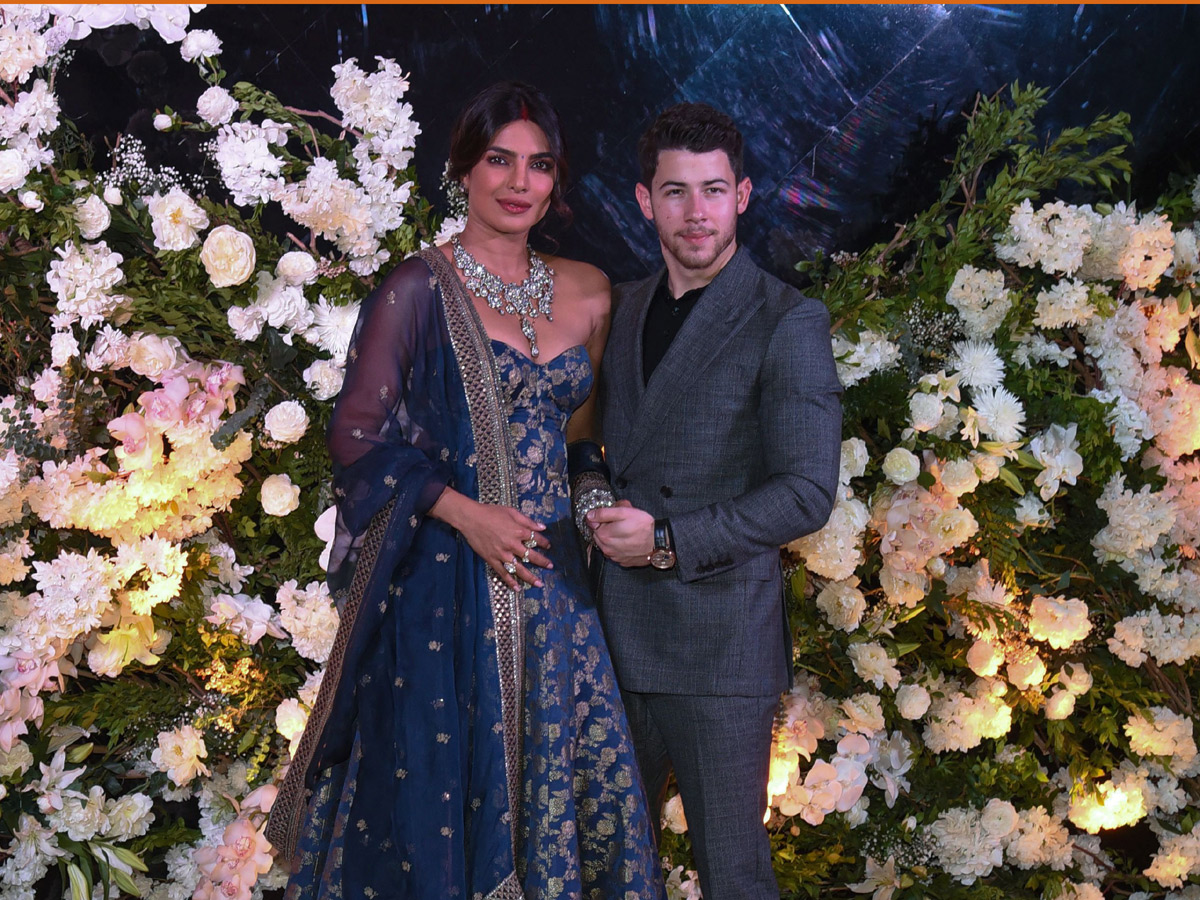 Priyanka Chopra and Nick Jonas pose wedding reception in Mumbai - Sakshi7