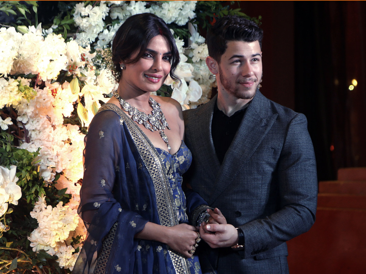 Priyanka Chopra and Nick Jonas pose wedding reception in Mumbai - Sakshi8