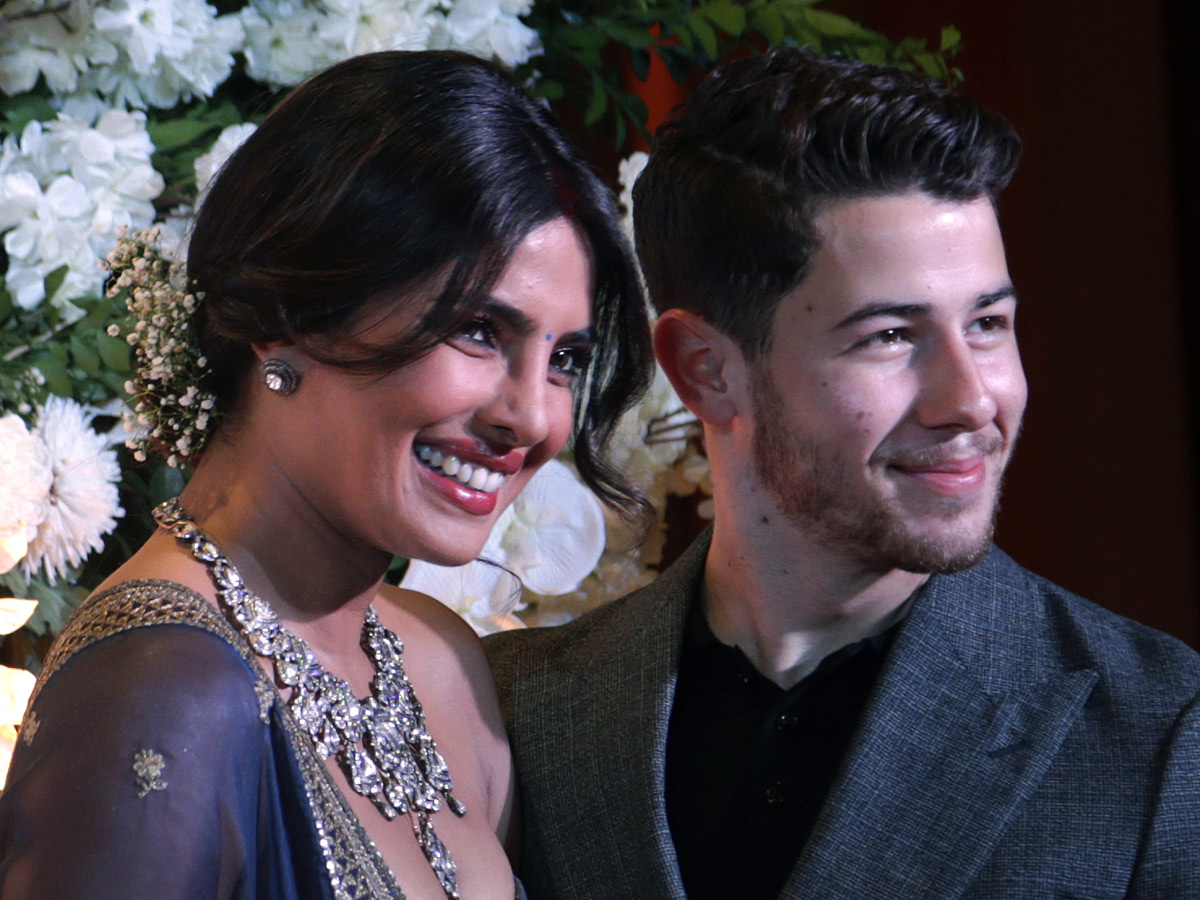 Priyanka Chopra and Nick Jonas pose wedding reception in Mumbai - Sakshi9