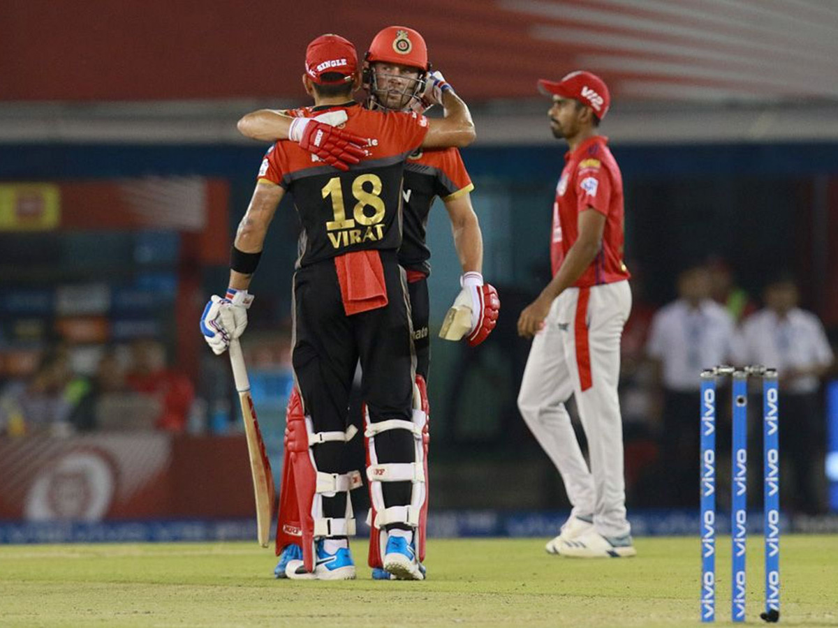 Royal Challengers Bangalore beat Kings XI Punjab for first win of the season - Sakshi1