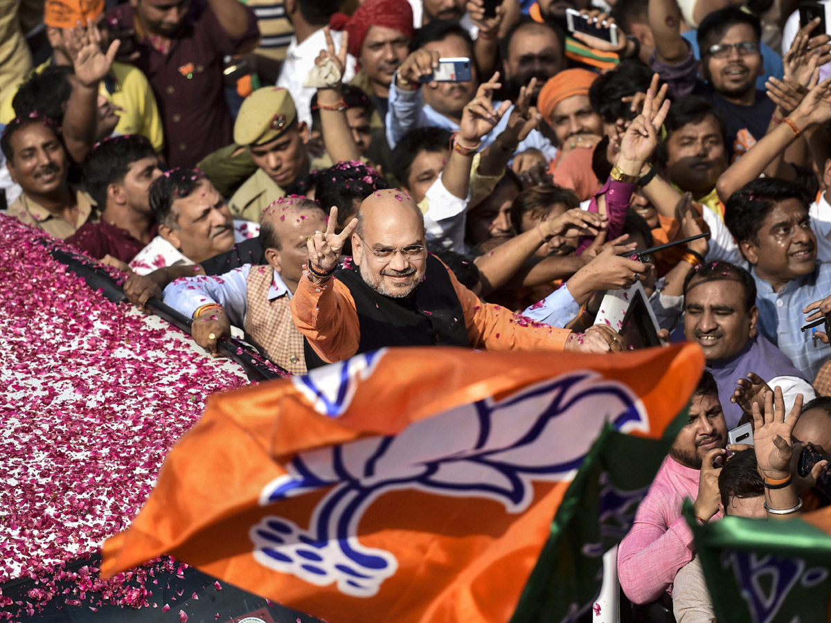 BJP supporters celebrate after trends indicate clean sweep  for NDA - Sakshi1