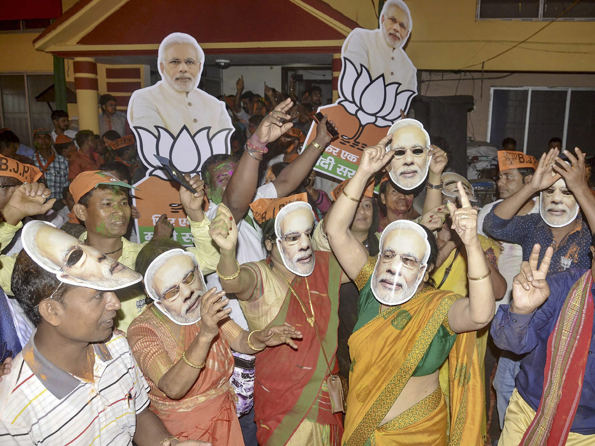 BJP supporters celebrate after trends indicate clean sweep  for NDA - Sakshi20