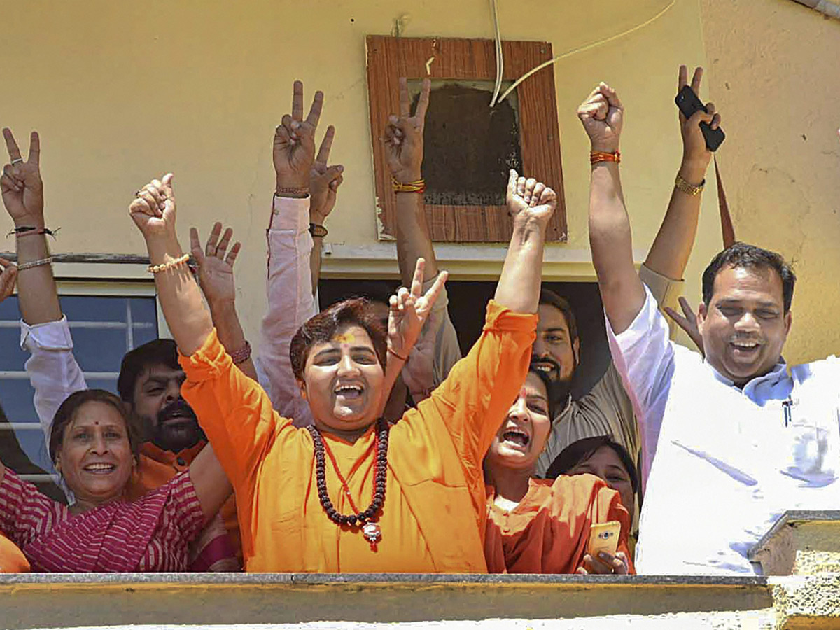 BJP supporters celebrate after trends indicate clean sweep  for NDA - Sakshi26