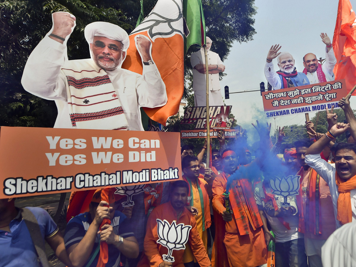 BJP supporters celebrate after trends indicate clean sweep  for NDA - Sakshi27