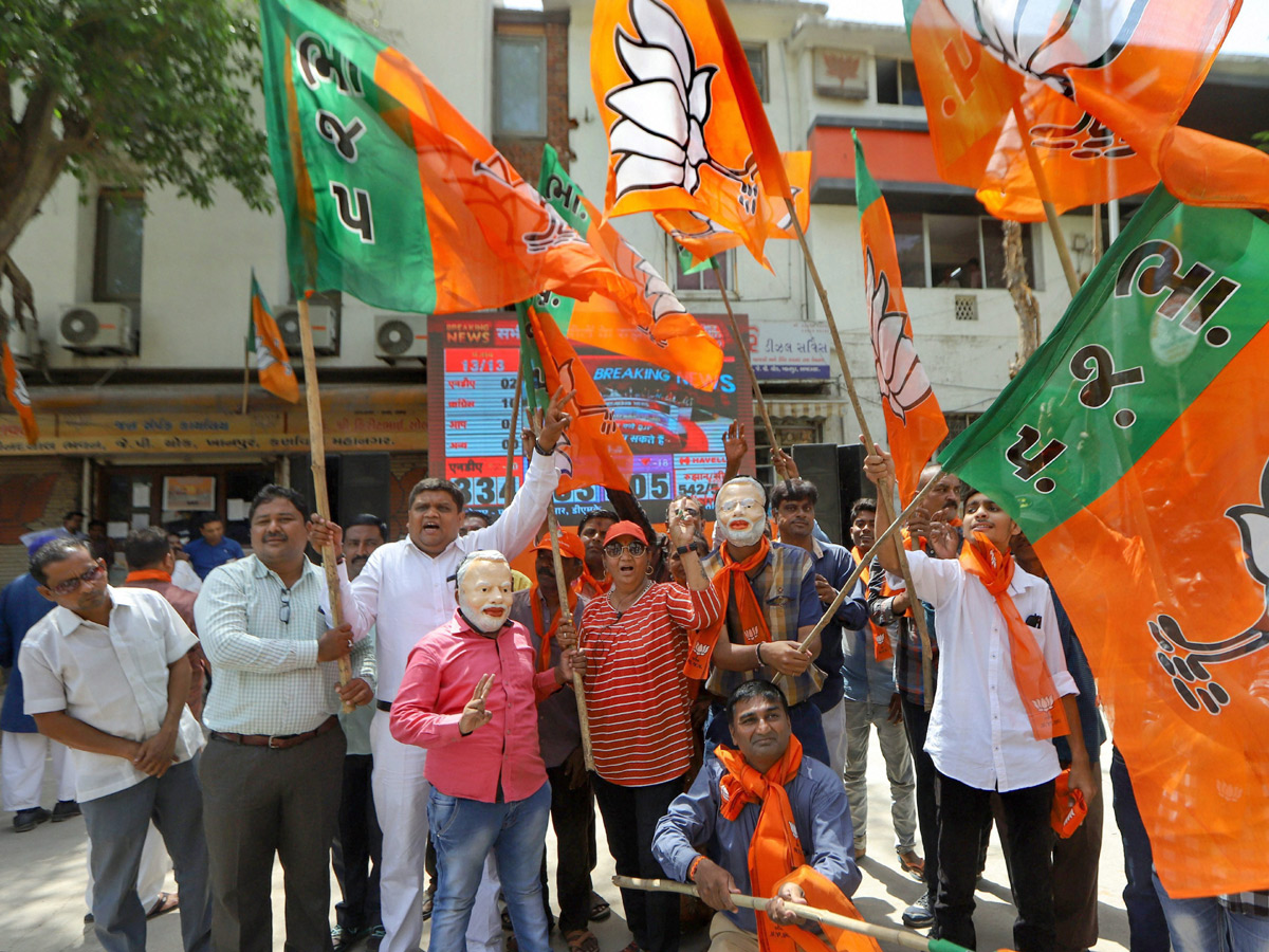 BJP supporters celebrate after trends indicate clean sweep  for NDA - Sakshi31