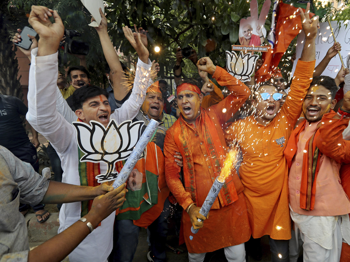 BJP supporters celebrate after trends indicate clean sweep  for NDA - Sakshi32