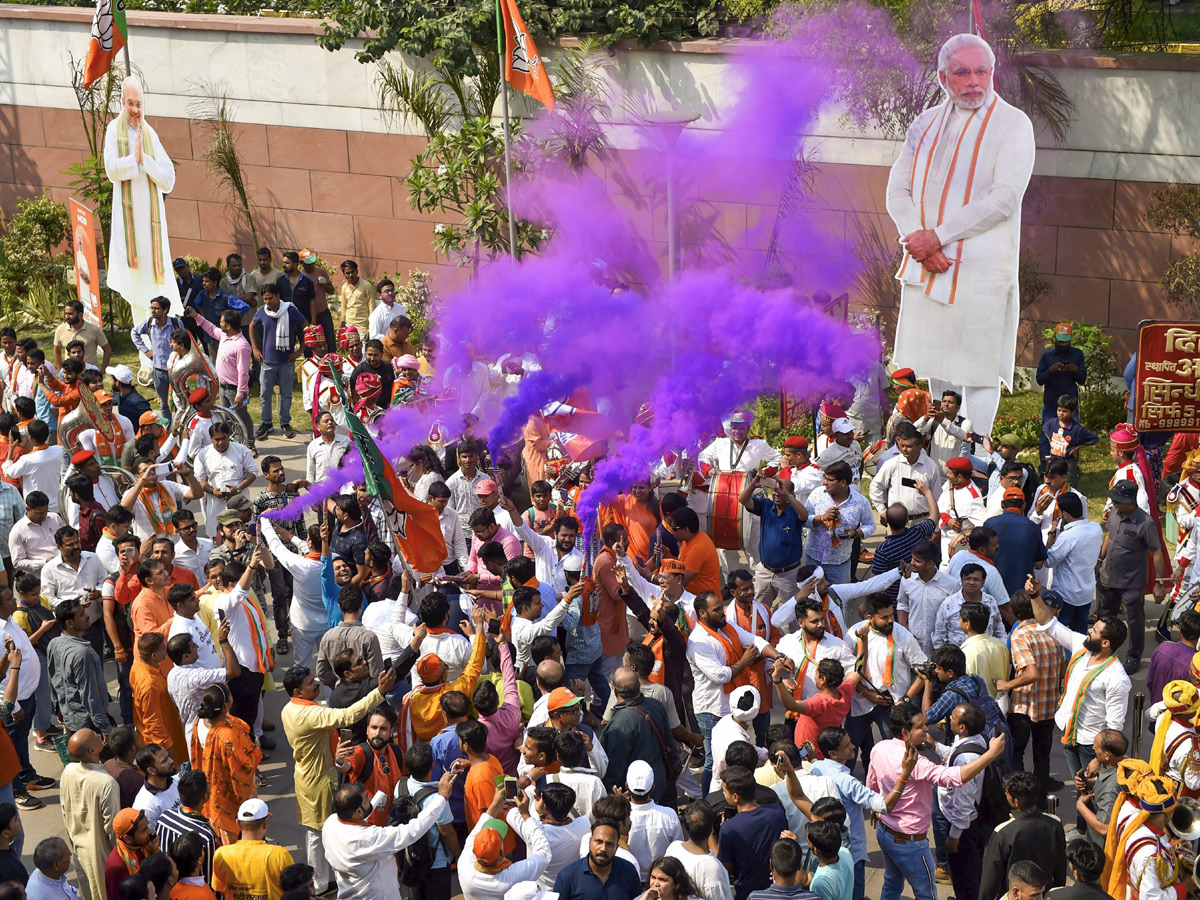 BJP supporters celebrate after trends indicate clean sweep  for NDA - Sakshi8